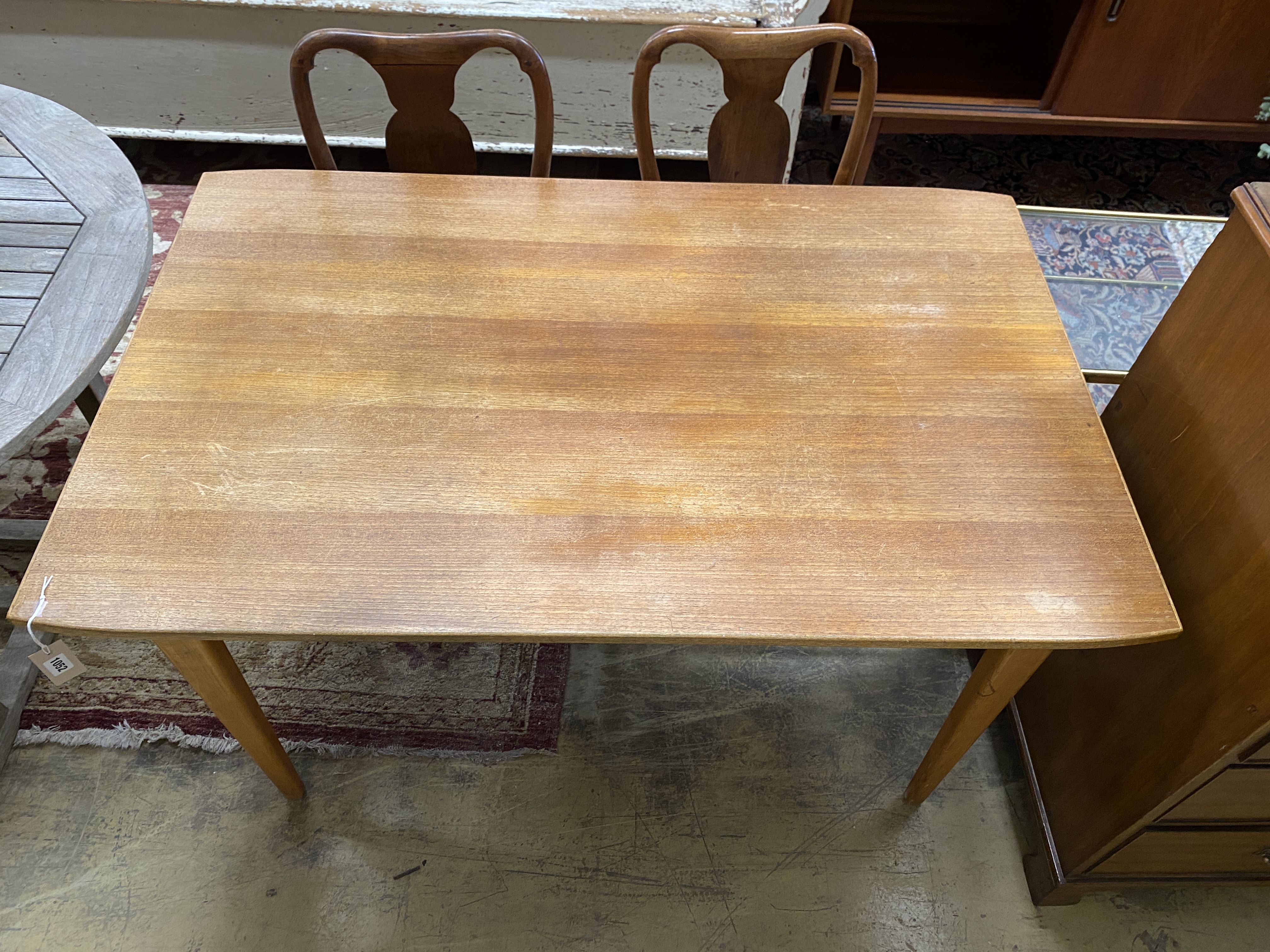 A mid century Gordon Russell, Broadway, rectangular teak dining table, length 130cm, width 82cm, height 75cm